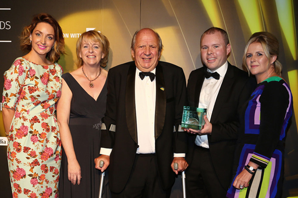 Jonathan & CEO Carmel Doyle winning the PRII Award