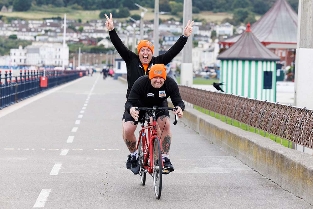 PJ and Jim on tandem bicycle