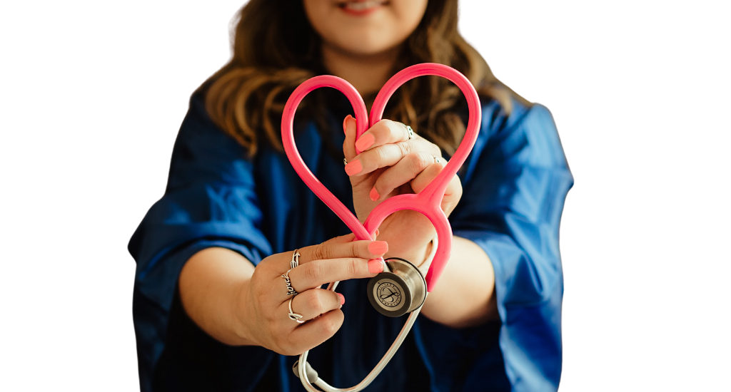 woman holding up stethoscope forming heart shape