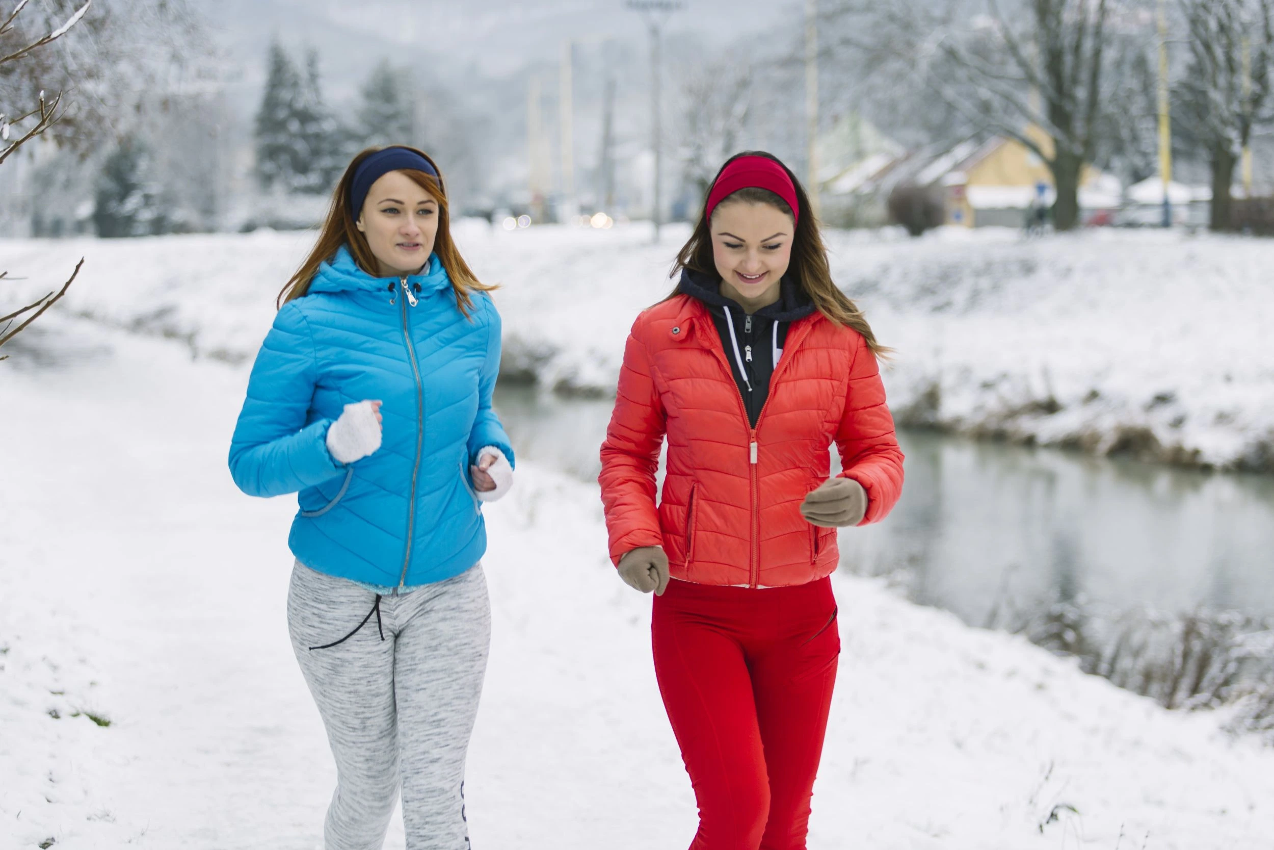 two women on a walk in the snow
