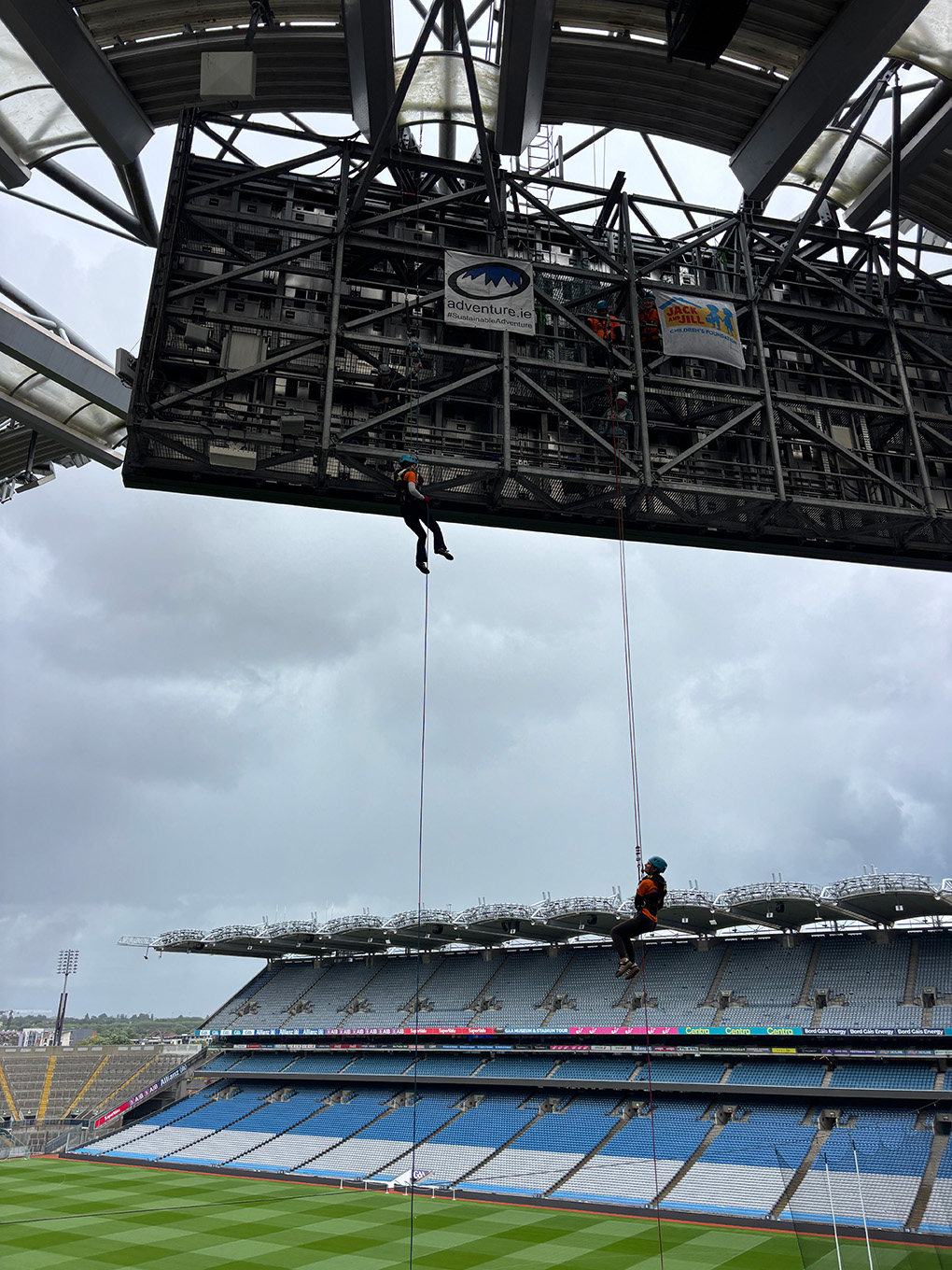 Jack and Jill Abseil participant 2026 Abseiling with view of Croke Park pitch behind them