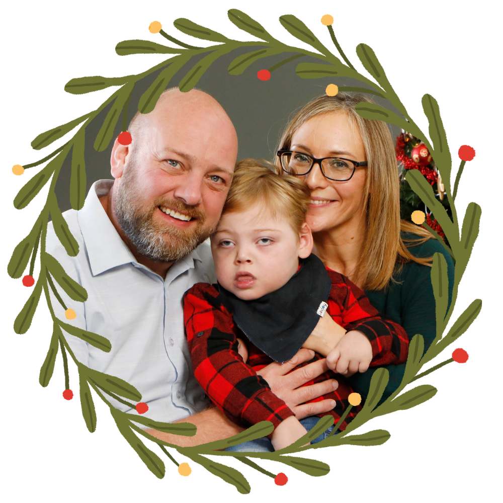 Inglis family inside Christmas wreath