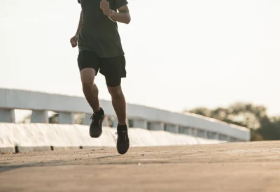 Silhouette of young man running