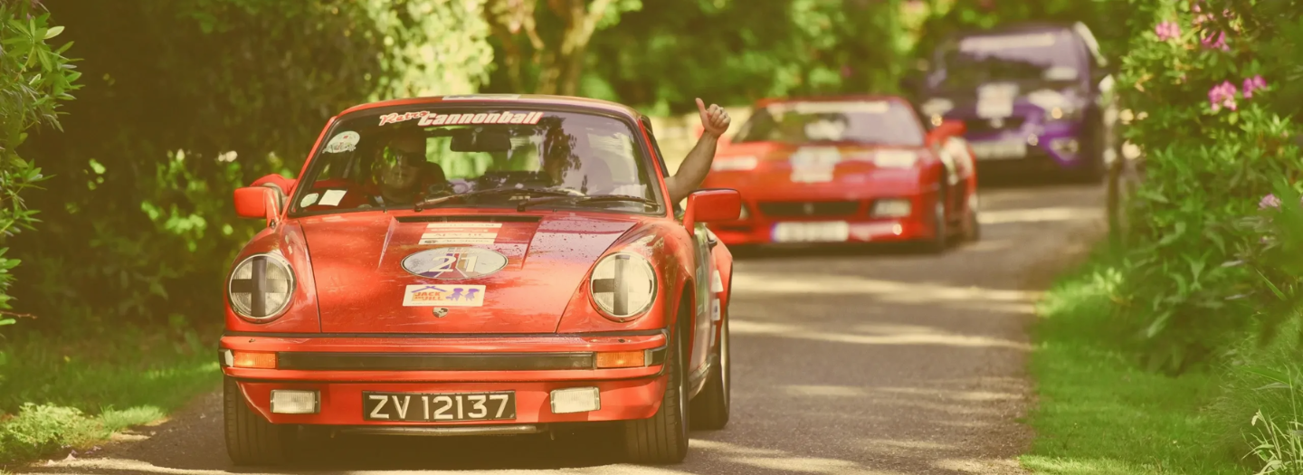 retro cannonball cars driving
