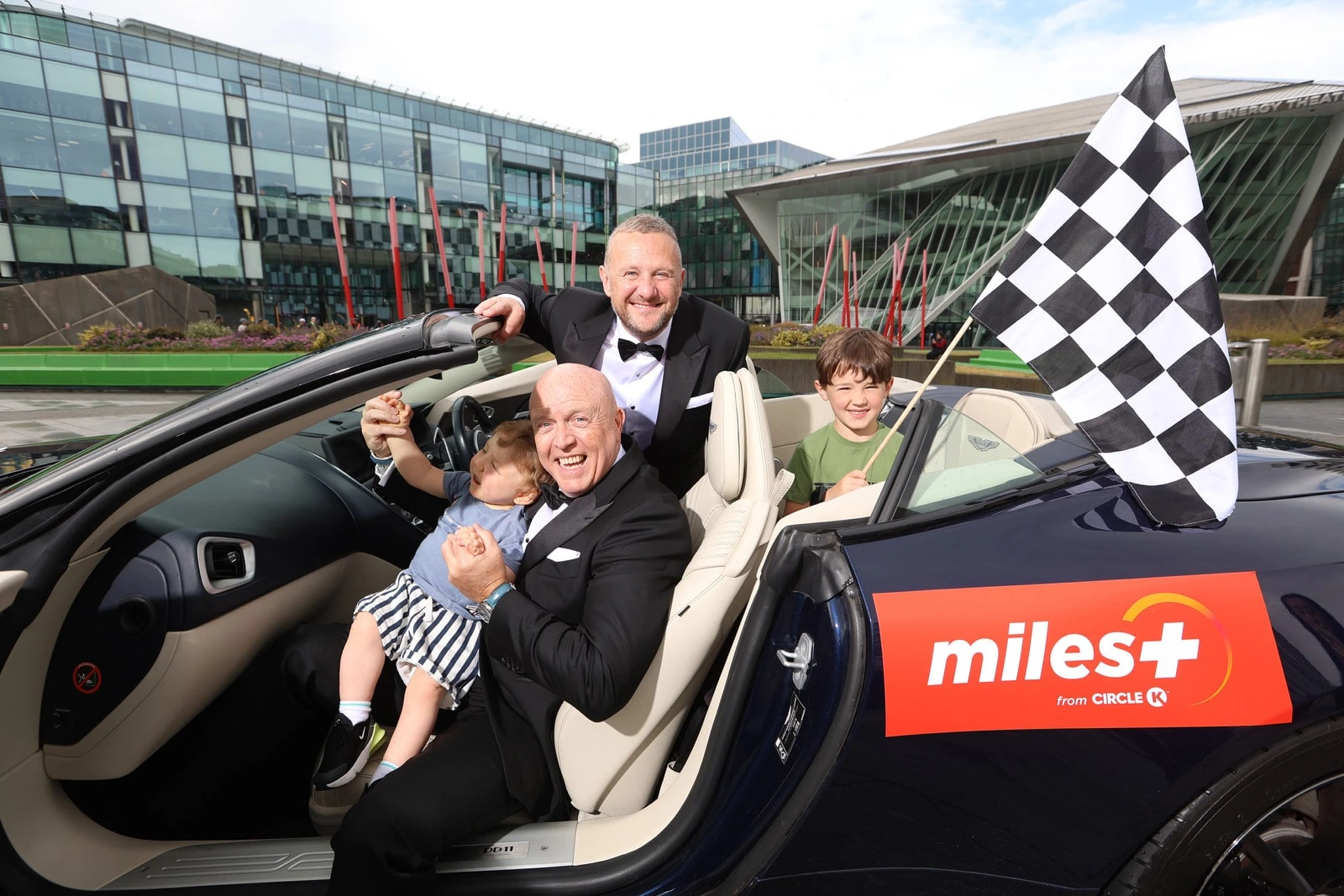 Jude Mangan from Dublin alongside big brother Cillian with Radio Nova’s PJ Gallagher and Jim McCabe in Aston Martin DB11