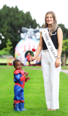 Rose of Tralee Katelyn Cummins giving roses to children at Jack and Jill Family Fun Day