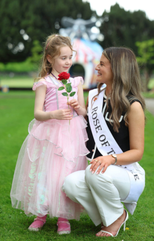 Rose of Tralee Katelyn Cummins giving roses to children at Jack and Jill Family Fun Day