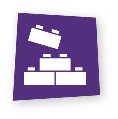 Purple square icon featuring white building bricks stacked together with one hovering above