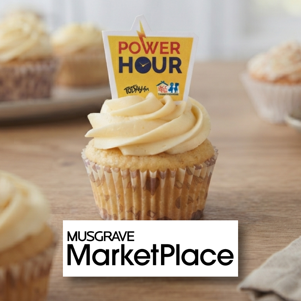 Musgrave Marketplace Galway bake sales A frosted cupcake with a "Power Hour" topper featuring Today FM and Jack & Jill branding, surrounded by other cupcakes on a wooden table, with the "Musgrave MarketPlace" logo overlaid at the bottom.