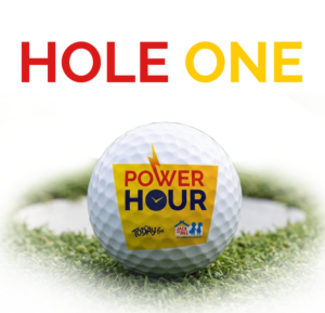 Graphic text reading 'HOLE ONE' above a white golf ball with the Power Hour, Today FM, and Jack & Jill logos, sitting on a green golf course near a hole.