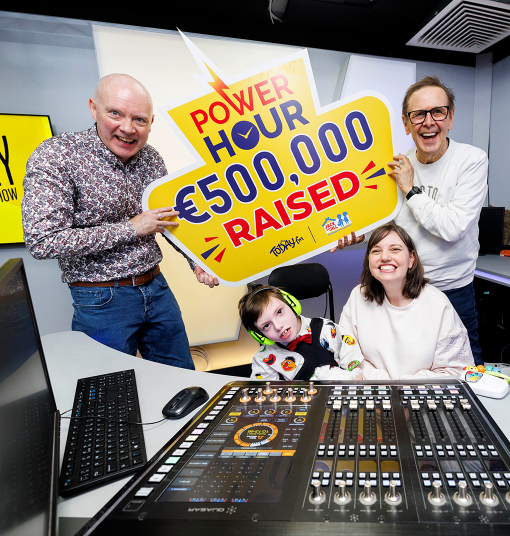 Ian Dempsey and the Garrahan Family-2 Ian Dempsey and the Garrahan family celebrating €500,000 raised for the Jack and Jill Foundation in a studio.