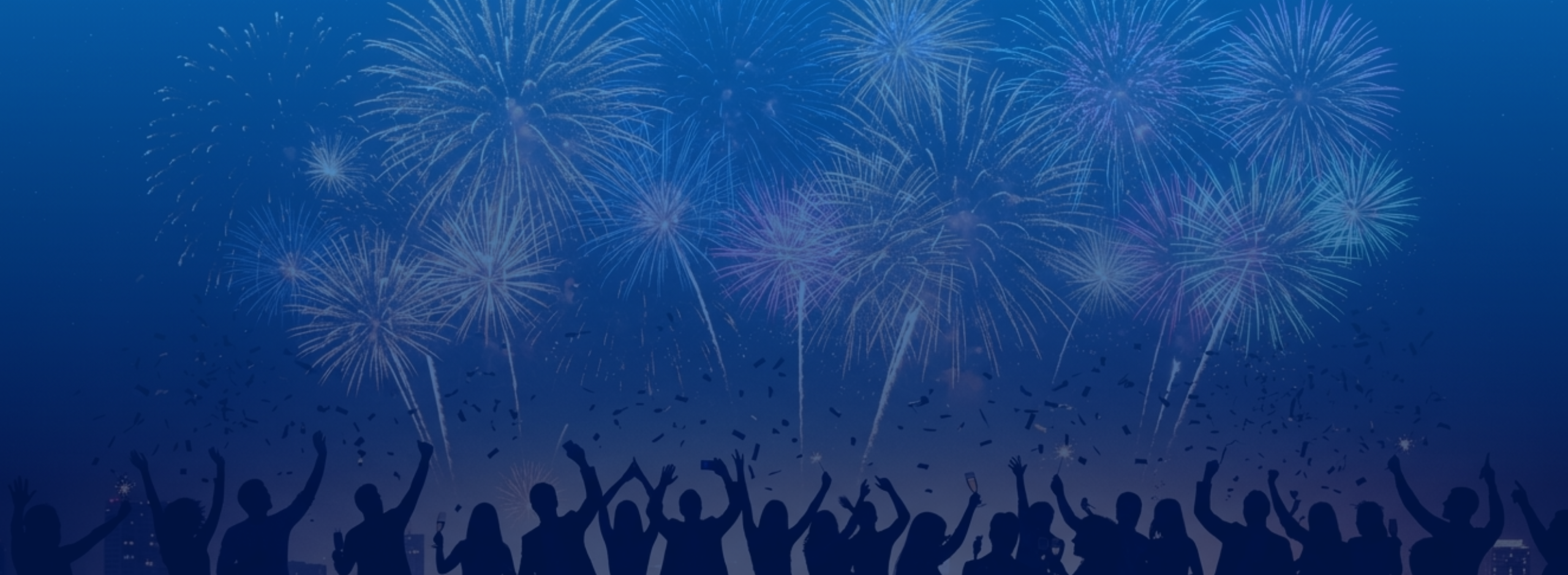 A crowd of people in silhouette celebrating with raised hands against a deep blue gradient background, which is filled with many large, colorful fireworks